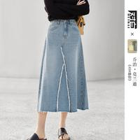 對白 2024年秋裝不對稱毛須邊女式中長牛仔半身裙